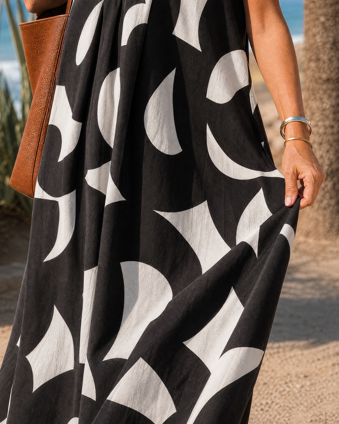 Amara | Abstract Print V Neck Flowing Midi Dress
