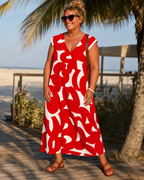 Amara | Abstract Print V Neck Flowing Midi Dress
