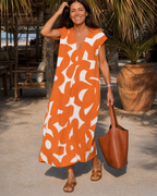 Amara | Abstract Print V Neck Flowing Midi Dress